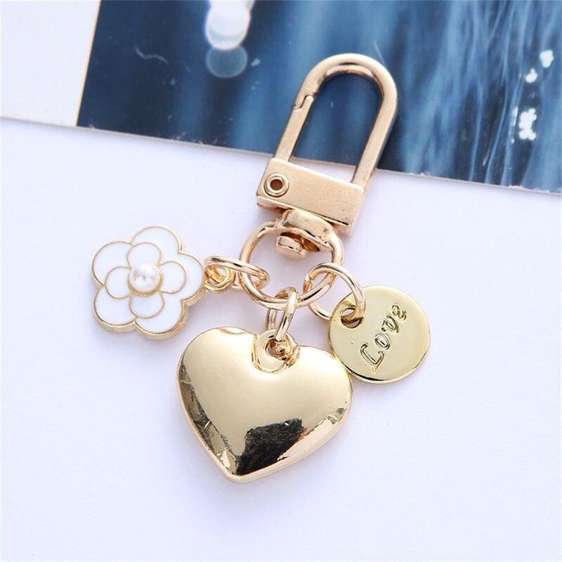 New Metal Heart Keychain Fashion Camellia Letters Round Pendant for Women Girls Headphone Case Accessorie Bag Trinket Party Gift